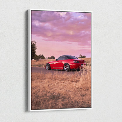 Honda S2000 red sports car at sunset on vertical canvas wall art with pink sky background.
