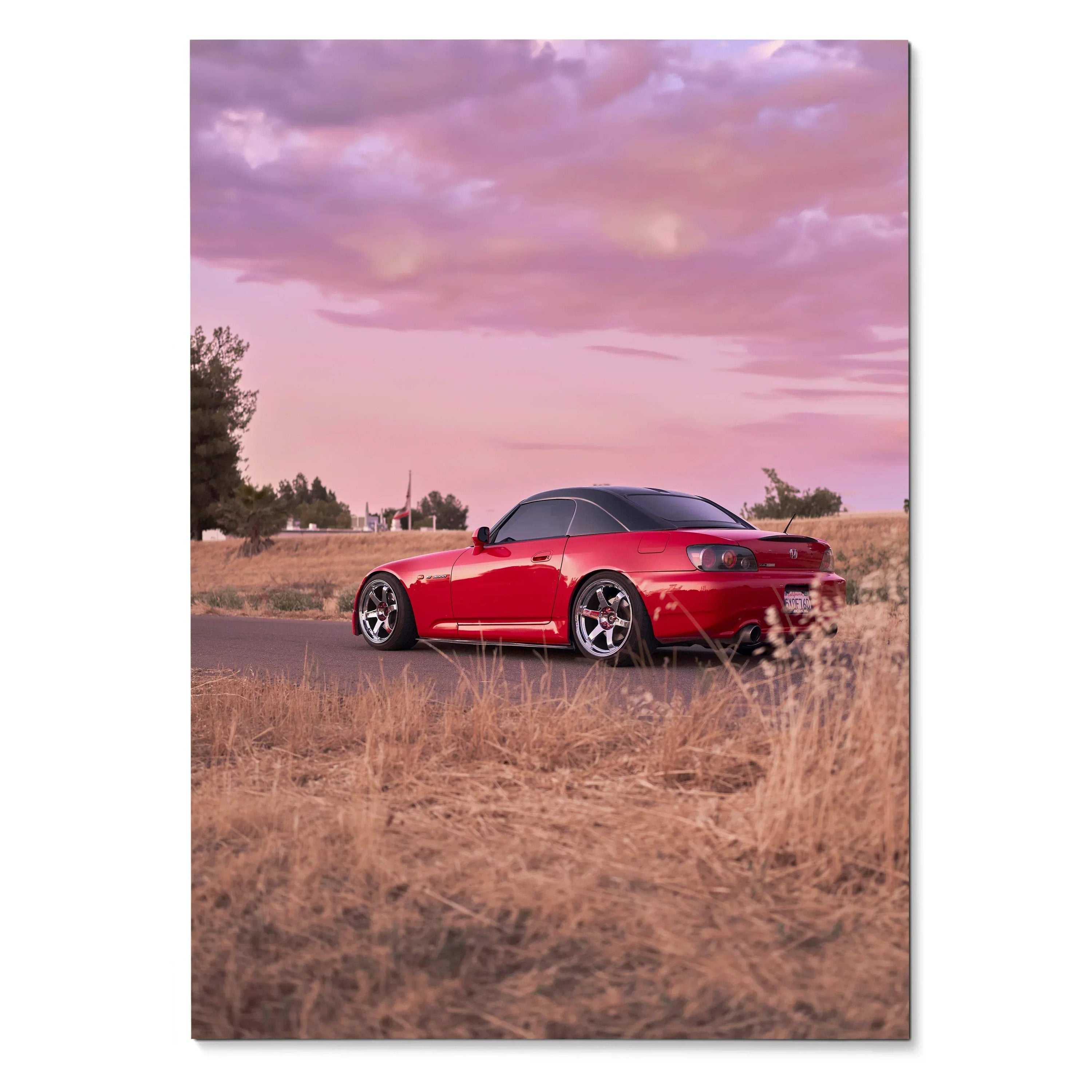 Red Honda S2000 sports car parked on a rural road at sunset poster wall art.