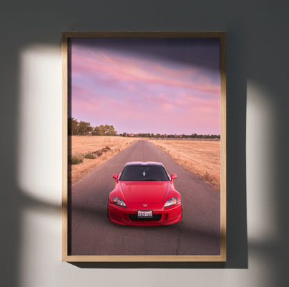 Honda S2000 red sports car poster with sunset sky and open road, wall art in wooden frame.