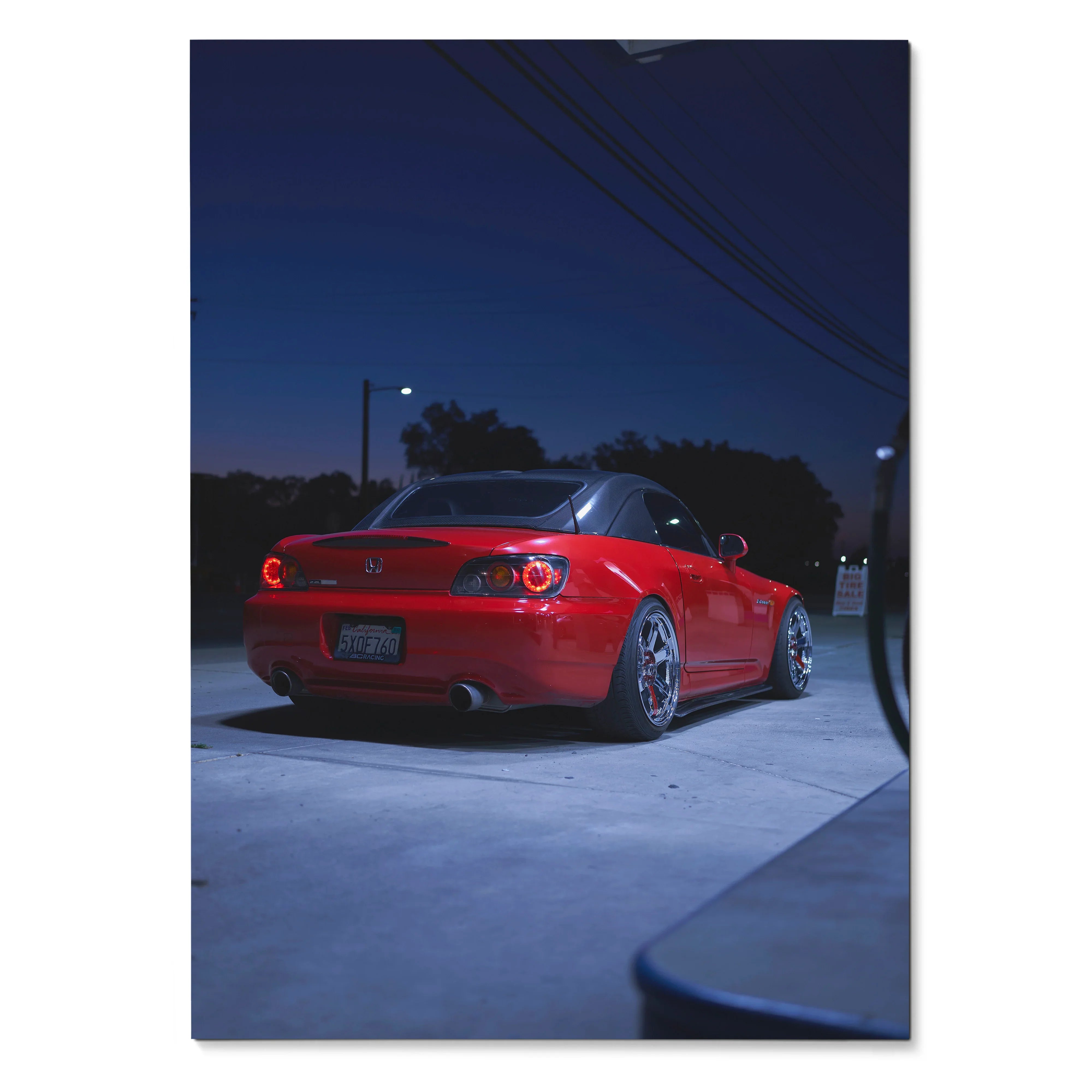 Red Honda S2000 sports car at night with glowing taillights poster wall art.