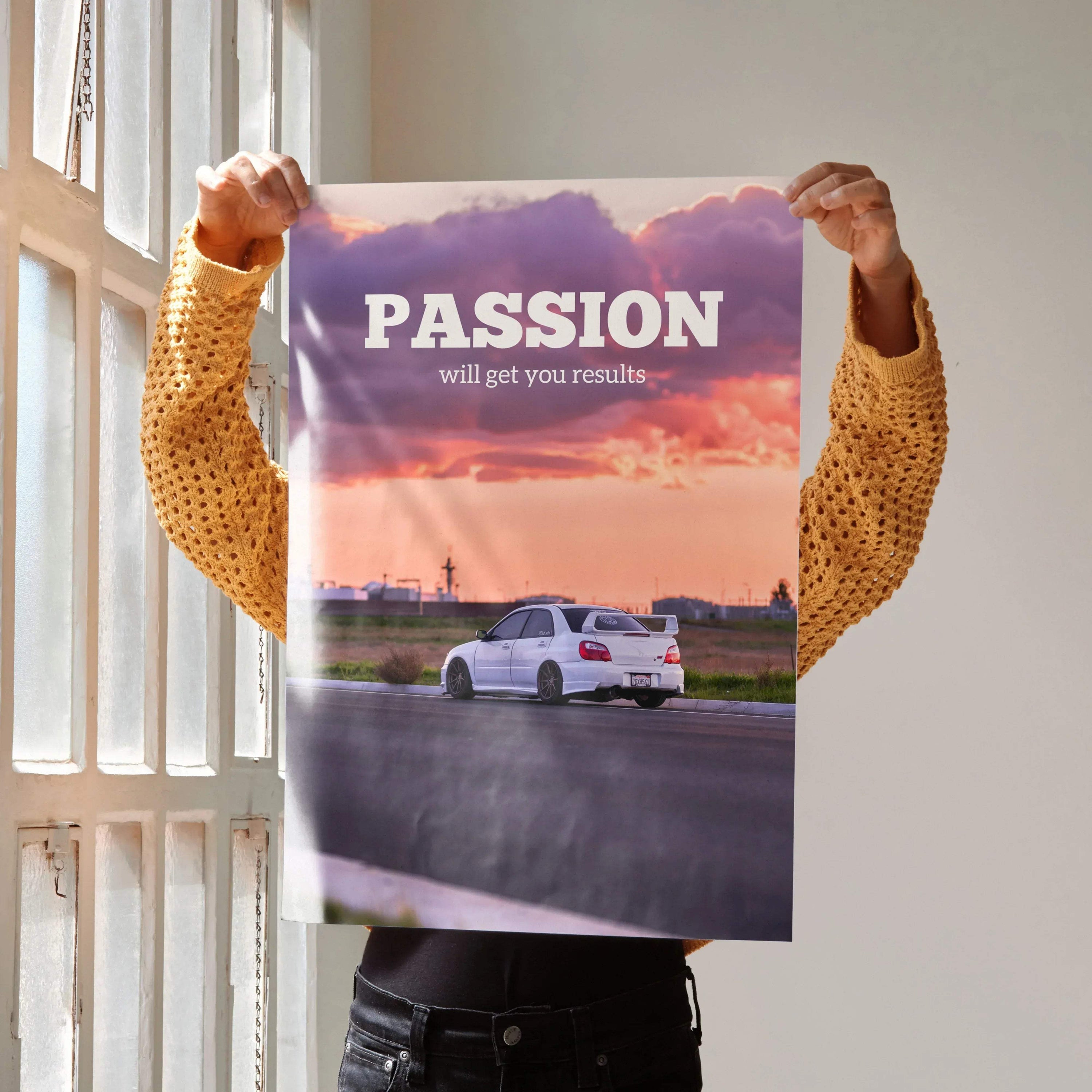 Motivational poster wall art featuring white Subaru WRX STI with "Passion will get you results" text against sunset sky.
