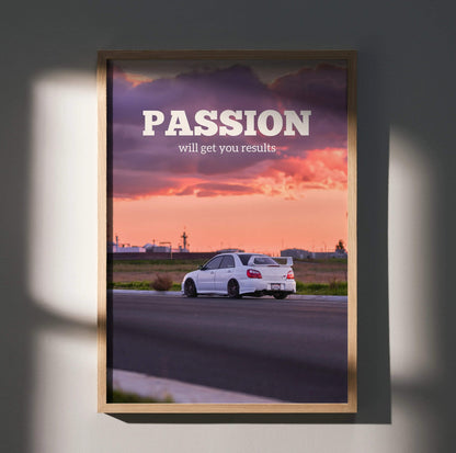 Motivational poster wall art featuring white Subaru WRX STI on road with sunset sky and "Passion will get you results" text.
