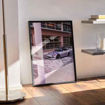 Honda S2000 poster wall art featuring a silver sports car parked by modern architecture.