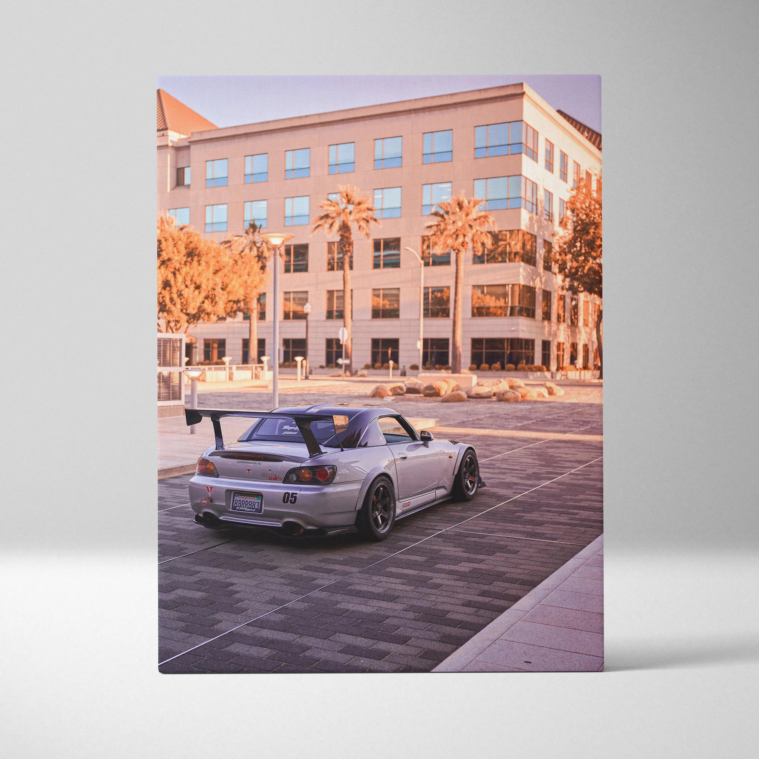Honda S2000 sports car parked in urban setting canvas wall art with warm sunset tones.