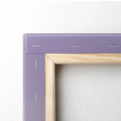 Close-up of canvas corner with wooden stretcher and staples, showcasing museum-quality canvas art texture.