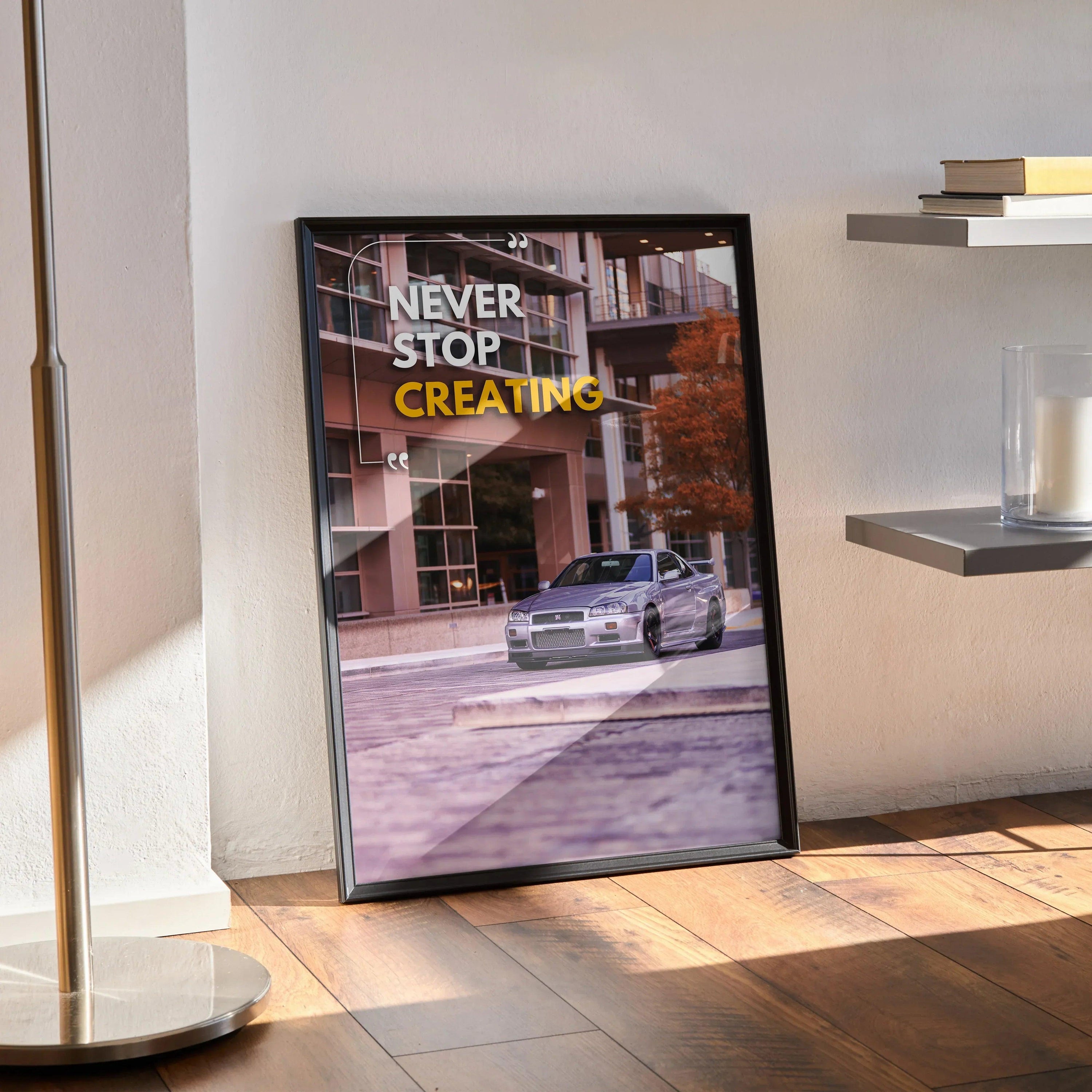 Nissan GT-R R34 Skyline poster with "Never Stop Creating" motivational text wall art in black frame.