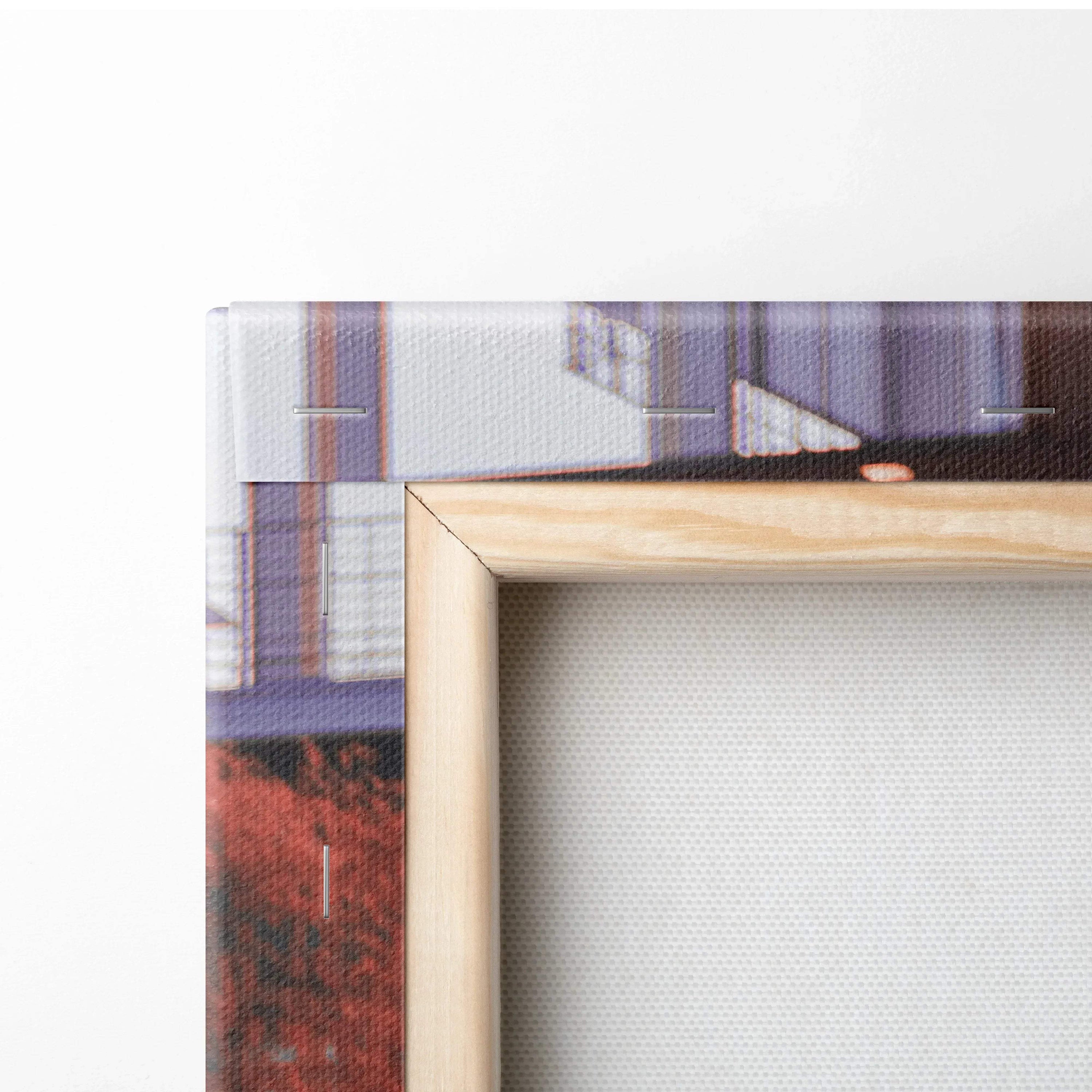 Close-up of wooden frame corner and textured canvas showing wall art with high-resolution print.