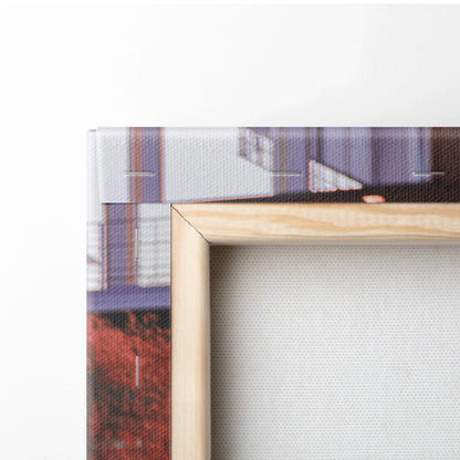 Close-up of wooden frame corner and textured canvas showing wall art with high-resolution print.