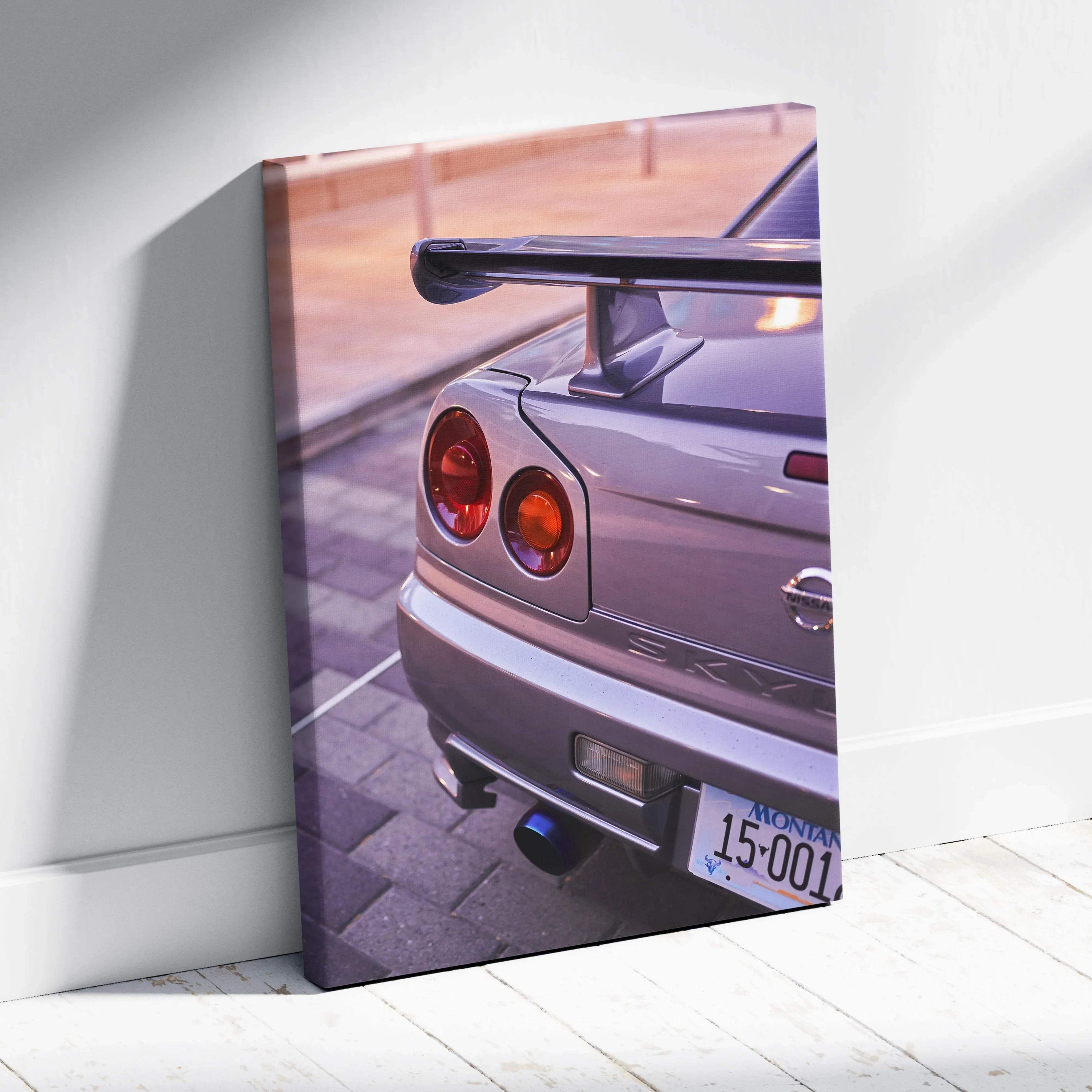 Nissan GTR R34 Skyline rear view on vertical canvas wall art with glossy finish.