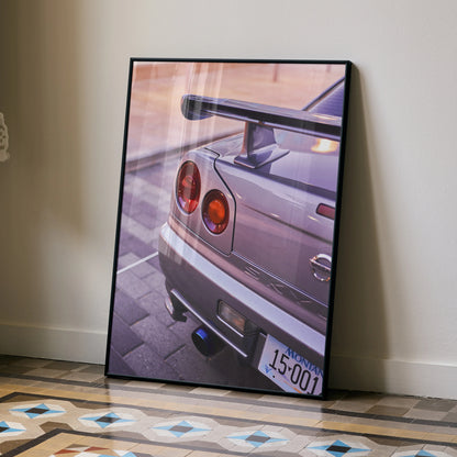 Poster of Nissan GTR R34 Skyline rear with spoiler and taillights leaning on wall wall art.