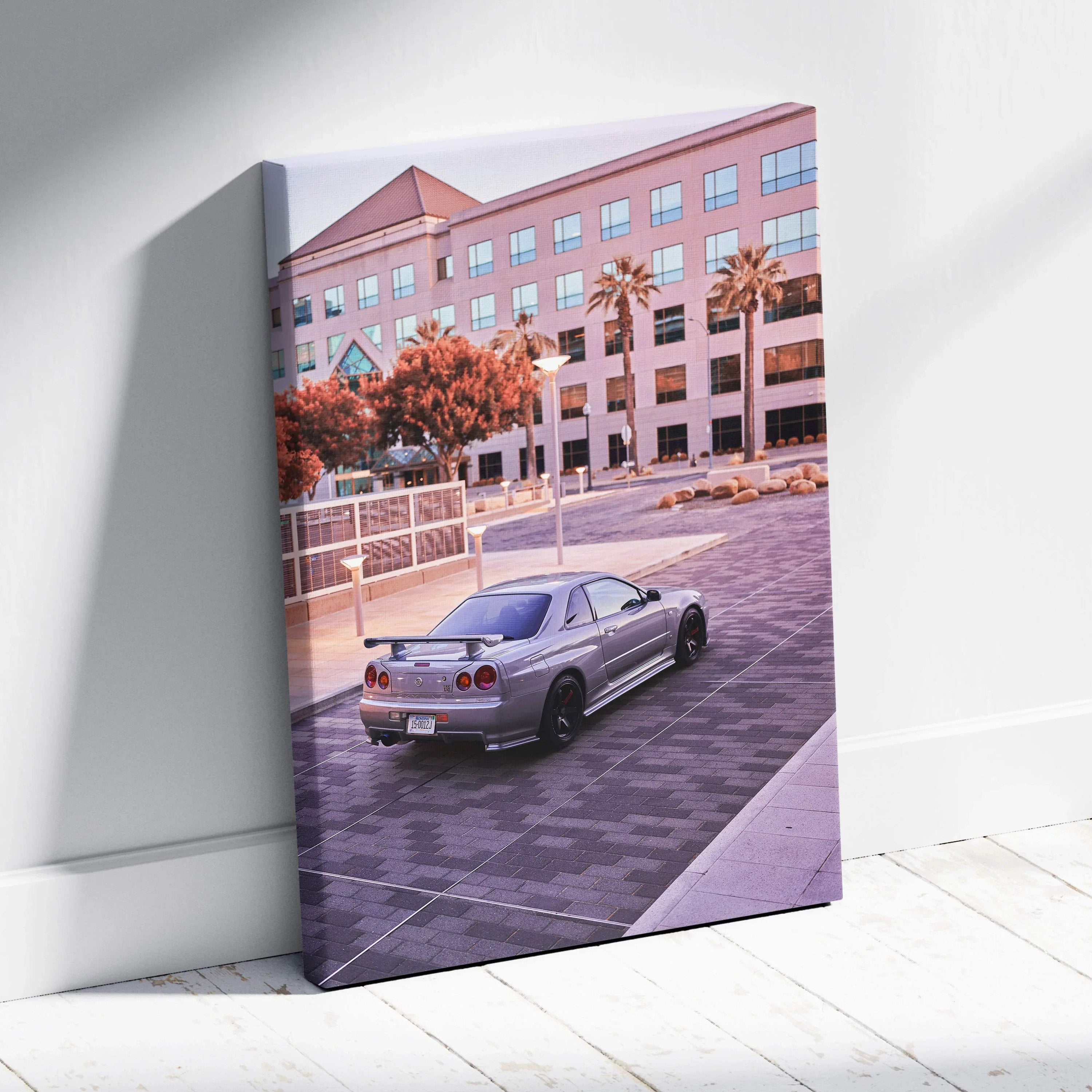 Nissan GTR R34 Skyline driving in urban setting canvas wall art with modern architecture backdrop.
