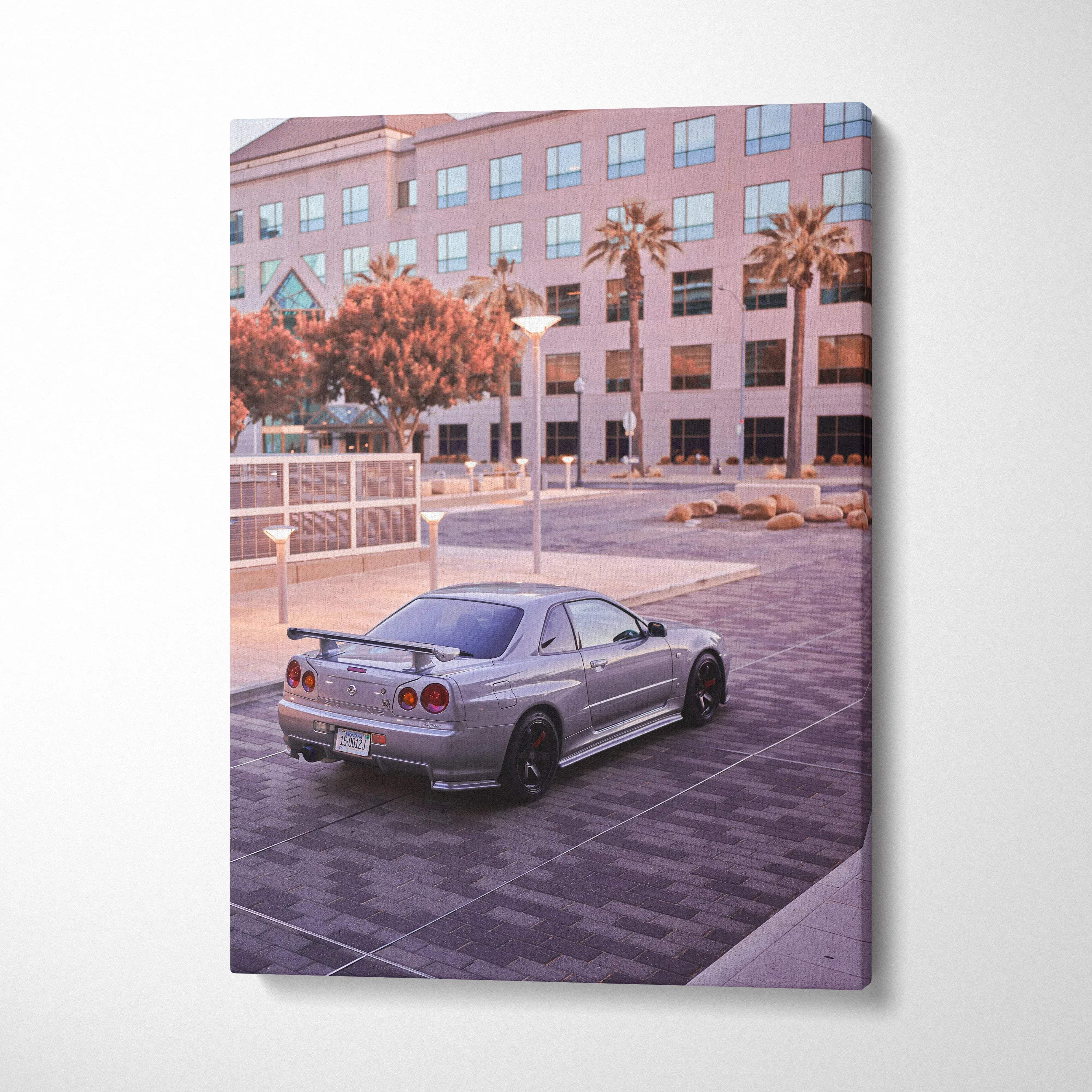 Nissan GTR R34 Skyline parked near modern building canvas wall art in soft pastel tones.