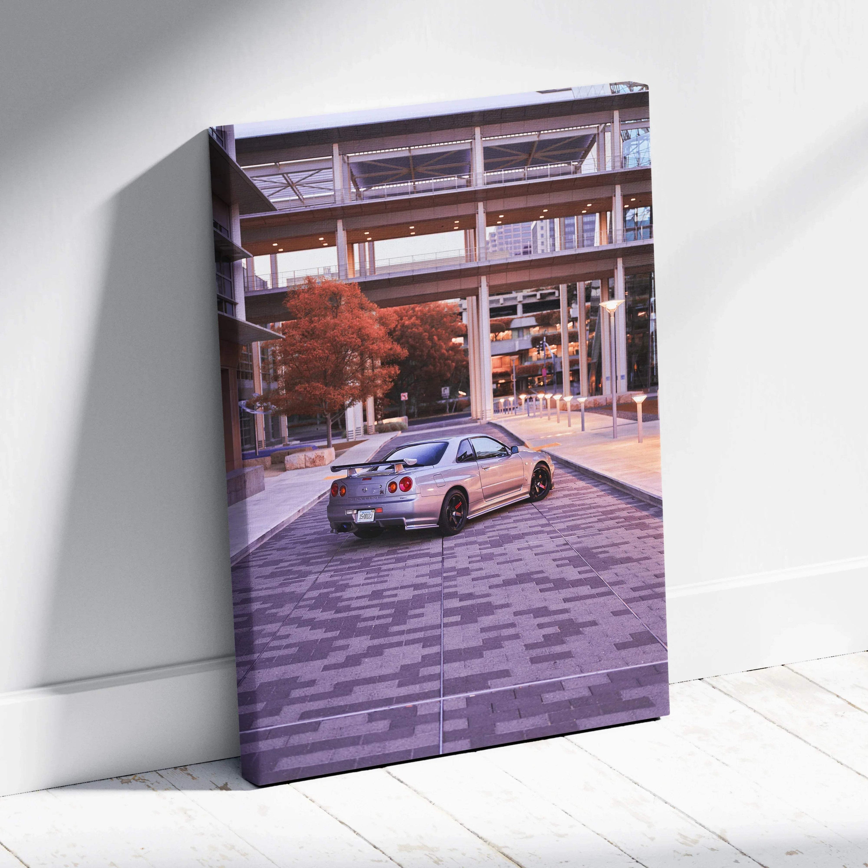 Nissan GTR R34 Skyline on urban street canvas wall art with modern architecture background.