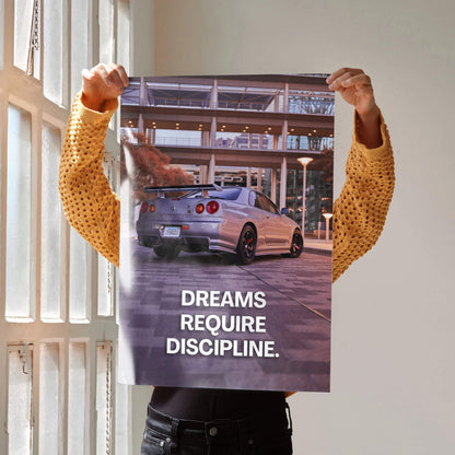 Motivational poster featuring Nissan GT-R R34 Skyline with inspiring text "Dreams Require Discipline" wall art.