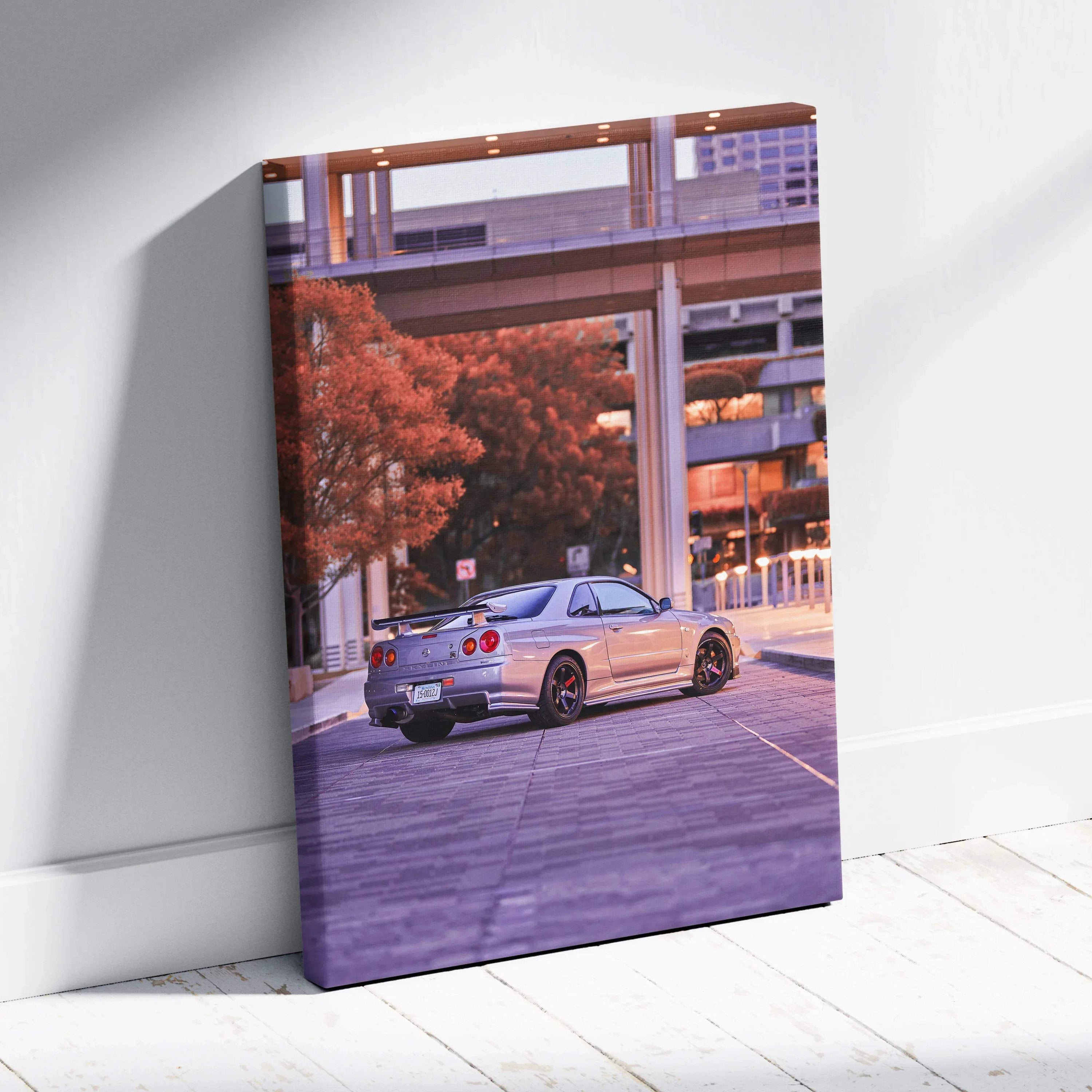 Nissan GTR R34 Skyline parked under urban overpass at sunset canvas wall art in vertical format.