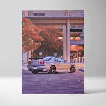 Nissan GTR R34 Skyline parked under urban overpass at sunset vertical canvas wall art.