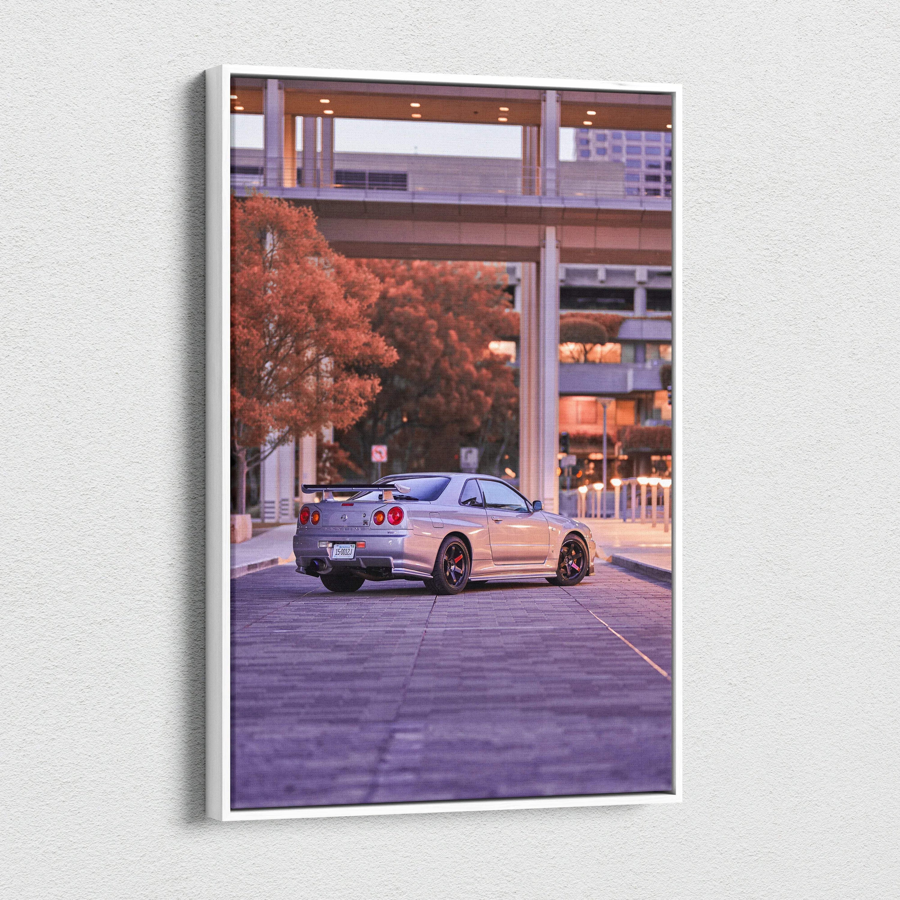 Vertical canvas art featuring a silver Nissan GTR R34 Skyline on urban street at dusk wall art.