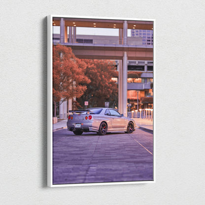 Vertical canvas art featuring a silver Nissan GTR R34 Skyline on urban street at dusk wall art.