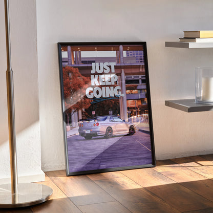 Nissan GT-R R34 Skyline poster with "Just Keep Going" motivational text in modern urban setting wall art.