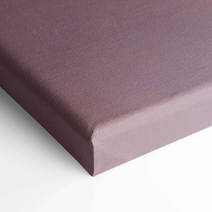 Close-up of purple textured canvas art wrapped around wooden stretcher bars for wall art display.