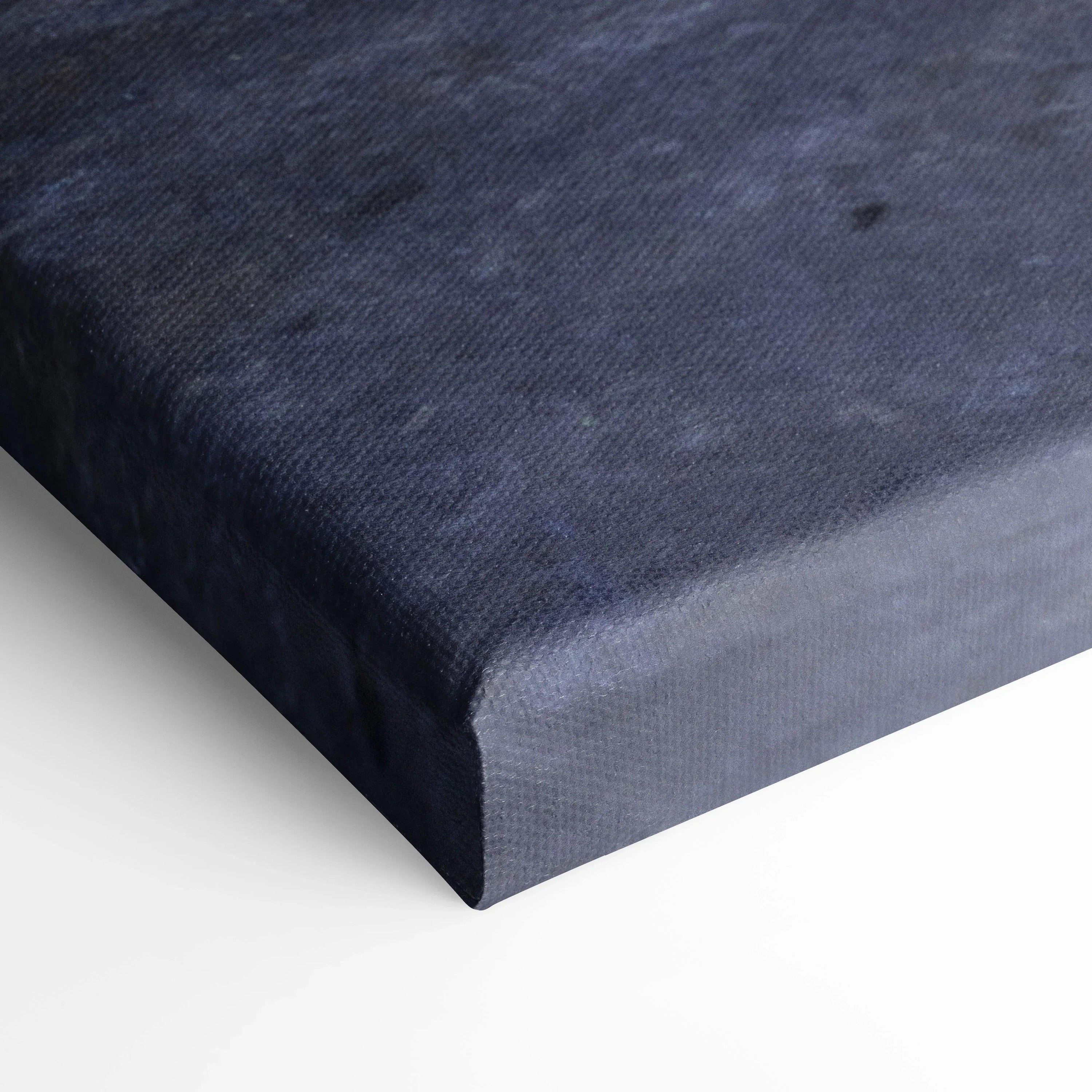 Close-up of dark textured canvas edge showcasing museum-quality vertical wall art printing.