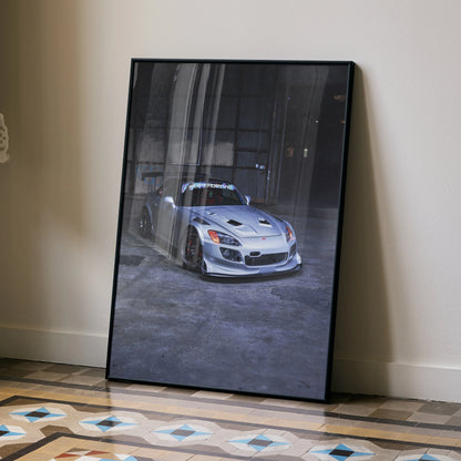 Honda S2000 poster wall art featuring a silver sports car in a dimly lit industrial setting.