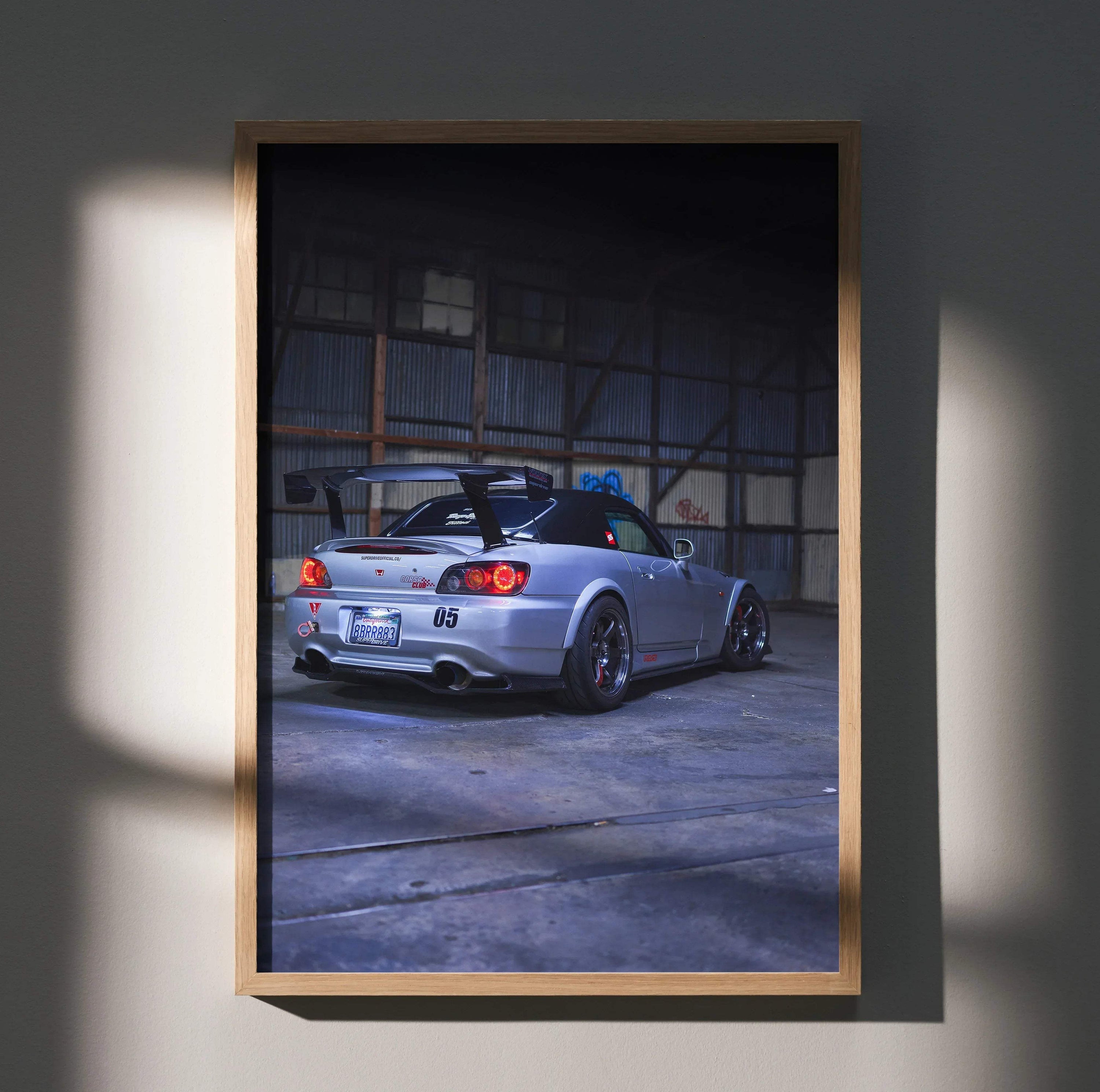 Honda S2000 silver sports car poster with dynamic rear view, urban garage wall art.