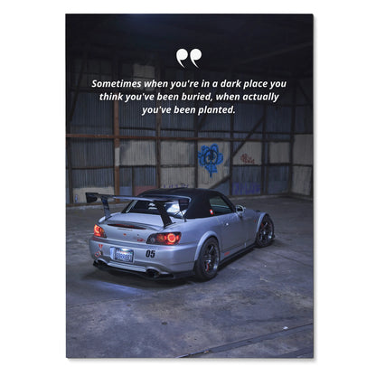 Motivational poster with silver Honda S2000 in a dim industrial space and inspiring text wall art.
