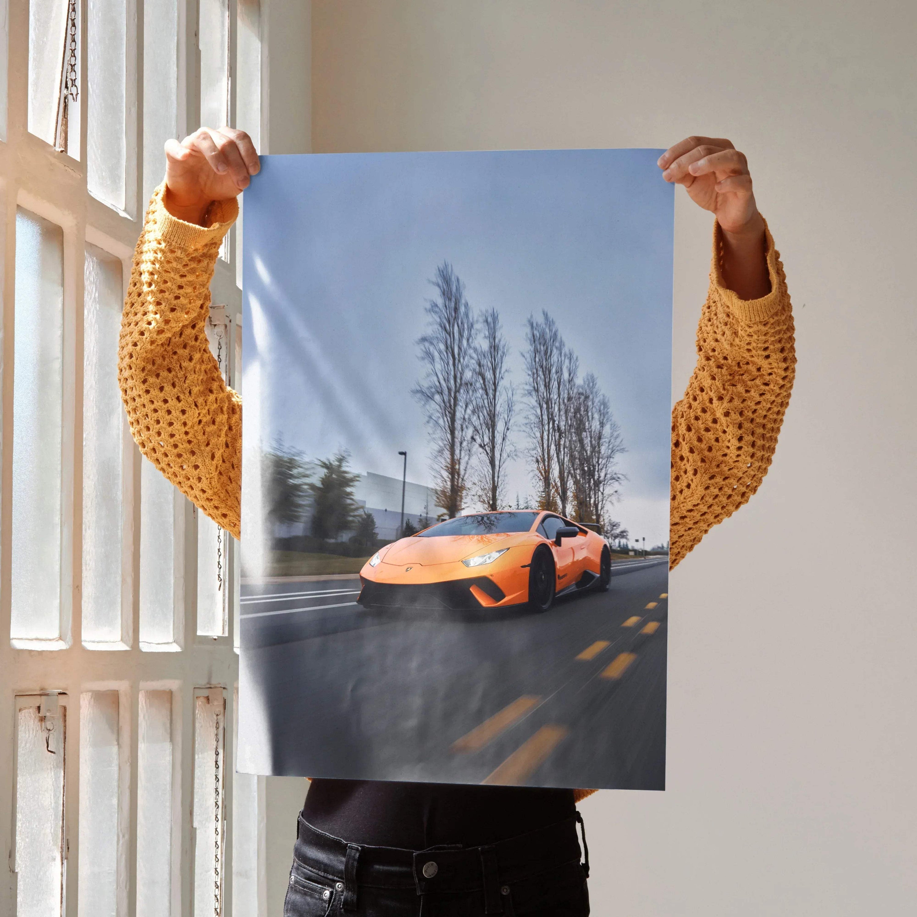 Lamborghini Huracan orange sports car on road with trees background poster wall art.