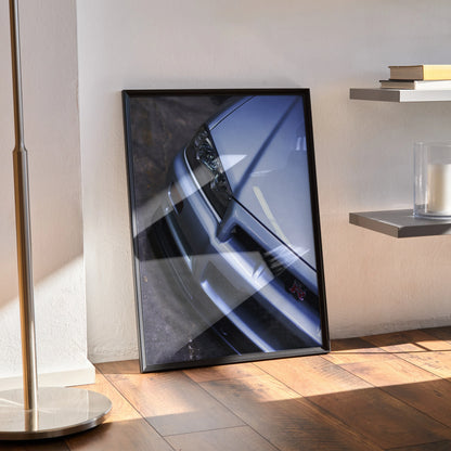 Nissan R34 GTR Skyline close-up poster with sleek silver car front in black frame wall art.
