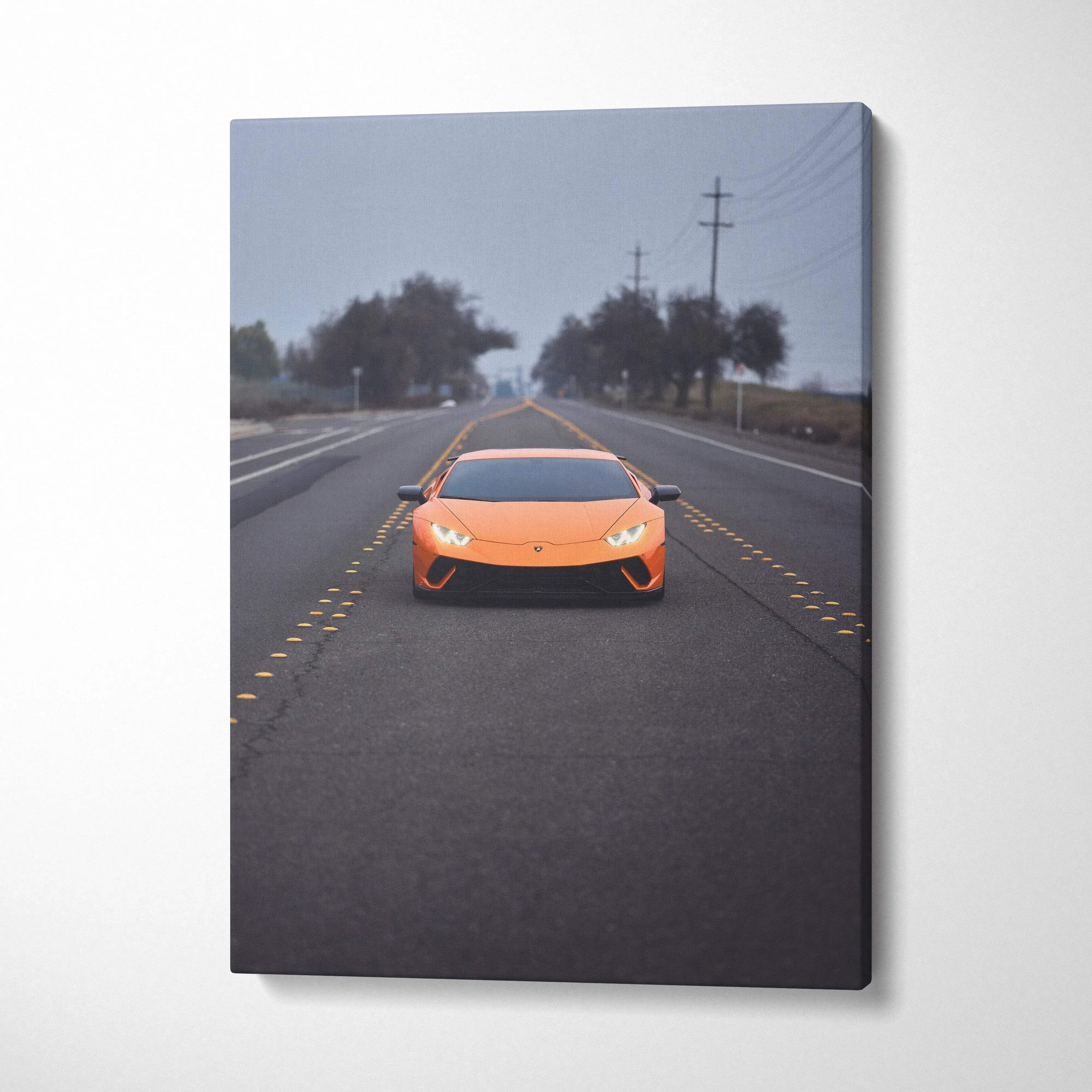 Orange Lamborghini Huracan on empty road canvas wall art vertical print.