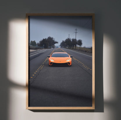 Lamborghini Huracan in orange on road poster, high resolution automotive wall art in wooden frame.