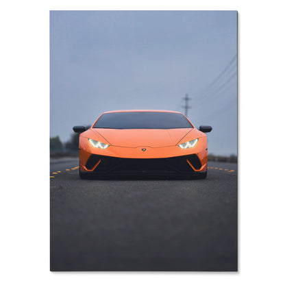 Orange Lamborghini Huracan front view on road at dusk poster wall art.