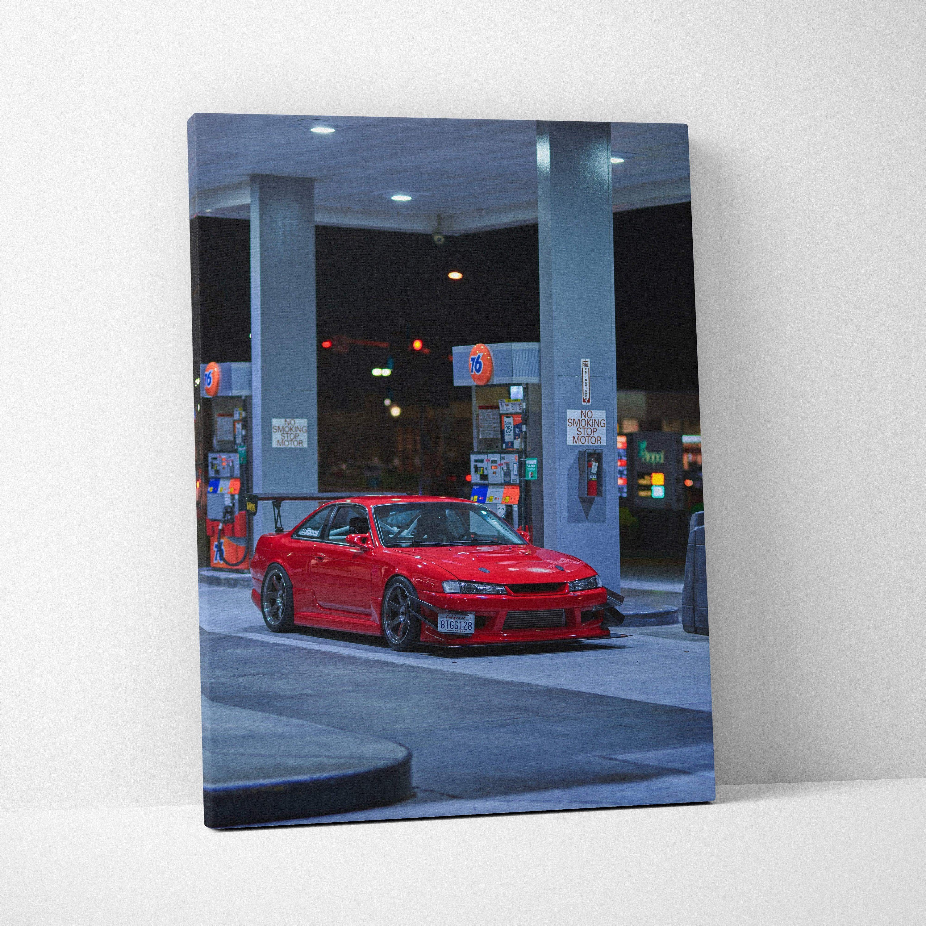 Red Nissan 240sx S14 Kouki car at gas station at night canvas wall art print.
