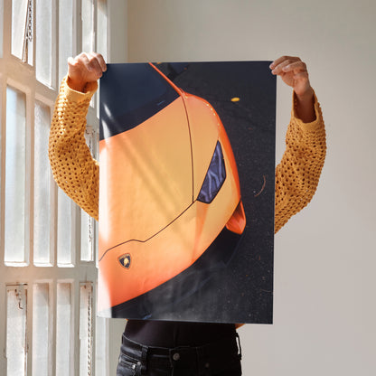 Lamborghini Huracan poster featuring bright orange car front close-up, premium wall art print.