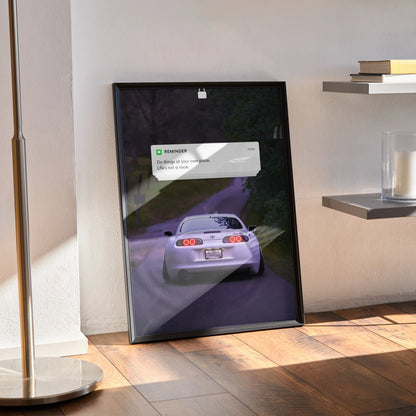 Motivational poster wall art featuring rear view of white Toyota Supra Mk4 on road at dusk.