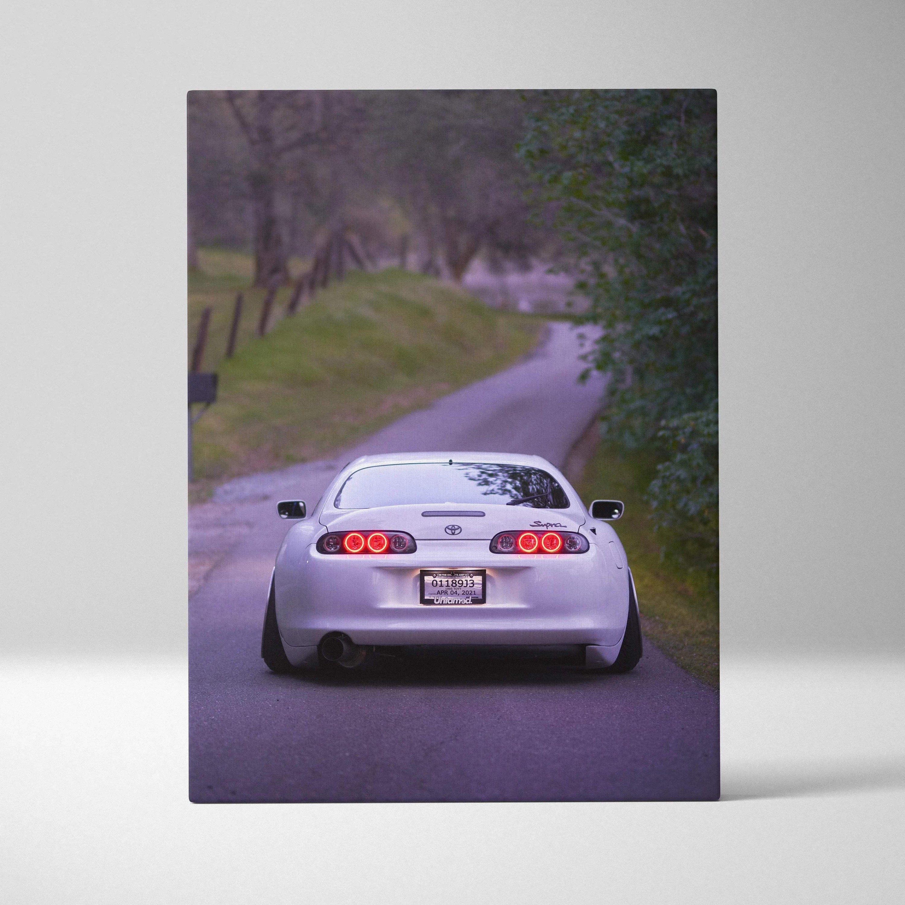 Toyota Supra MK4 rear view on road canvas wall art with museum quality vertical print.