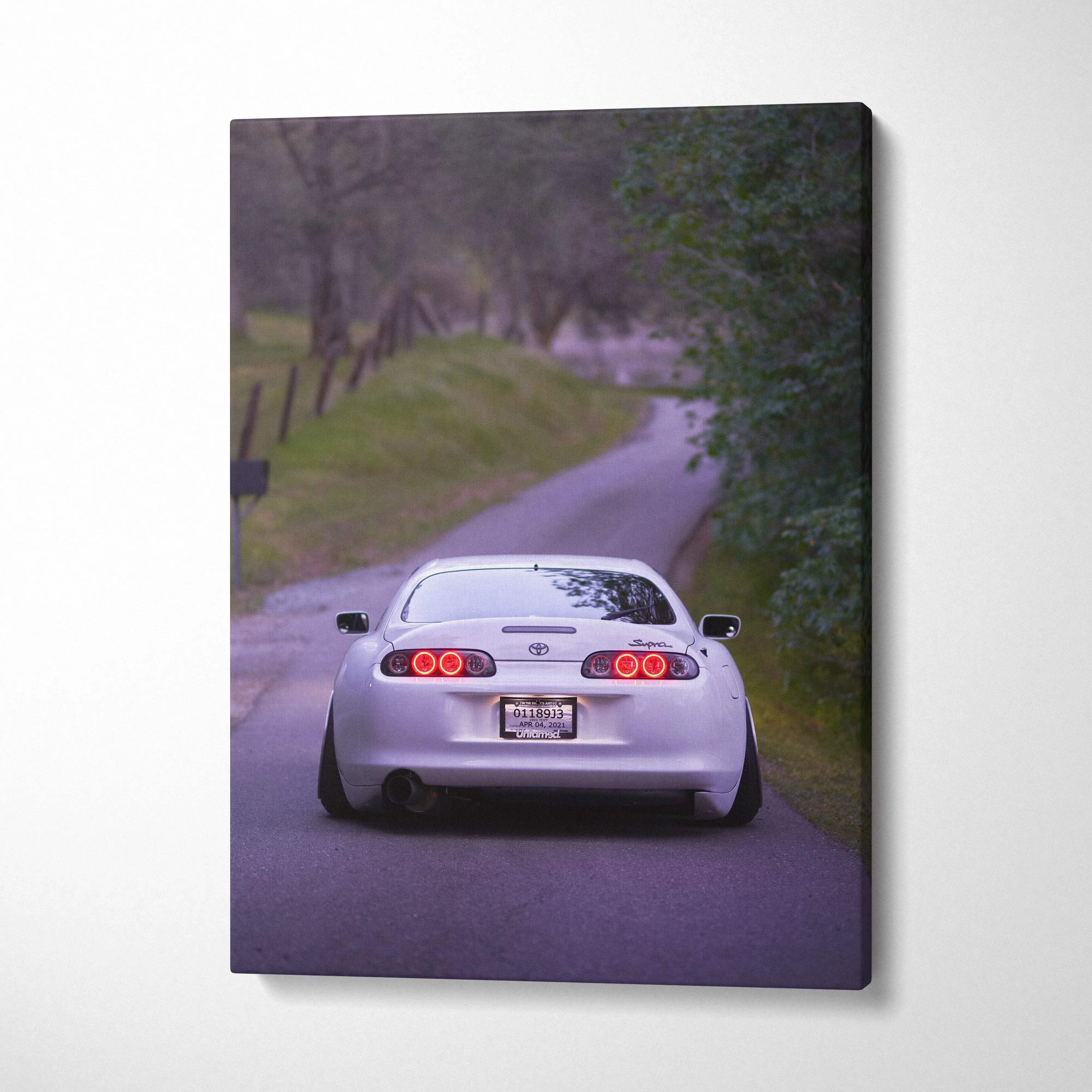 Toyota Supra MK4 rear view on rural road canvas wall art vertical canvas art print.