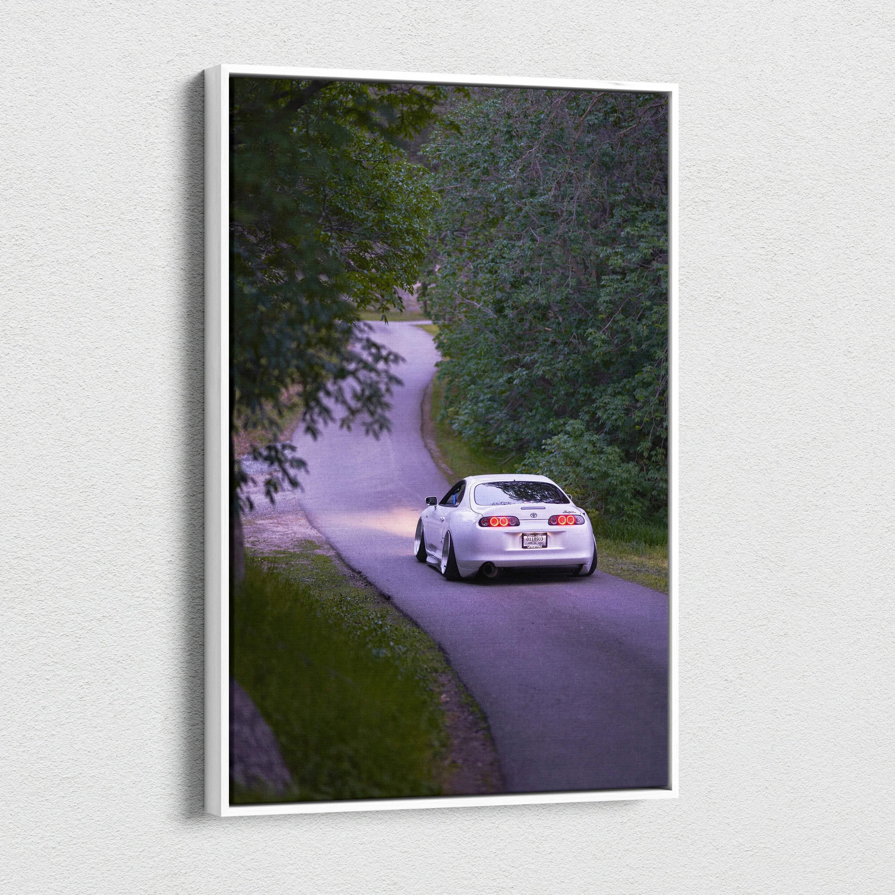 Toyota Supra MK4 driving on winding road canvas art wall decor vertical canvas print.