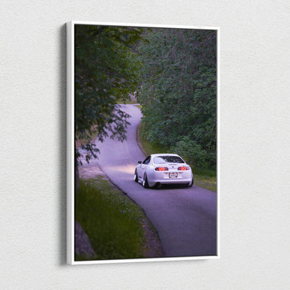 Toyota Supra MK4 driving on winding road canvas art wall decor vertical canvas print.