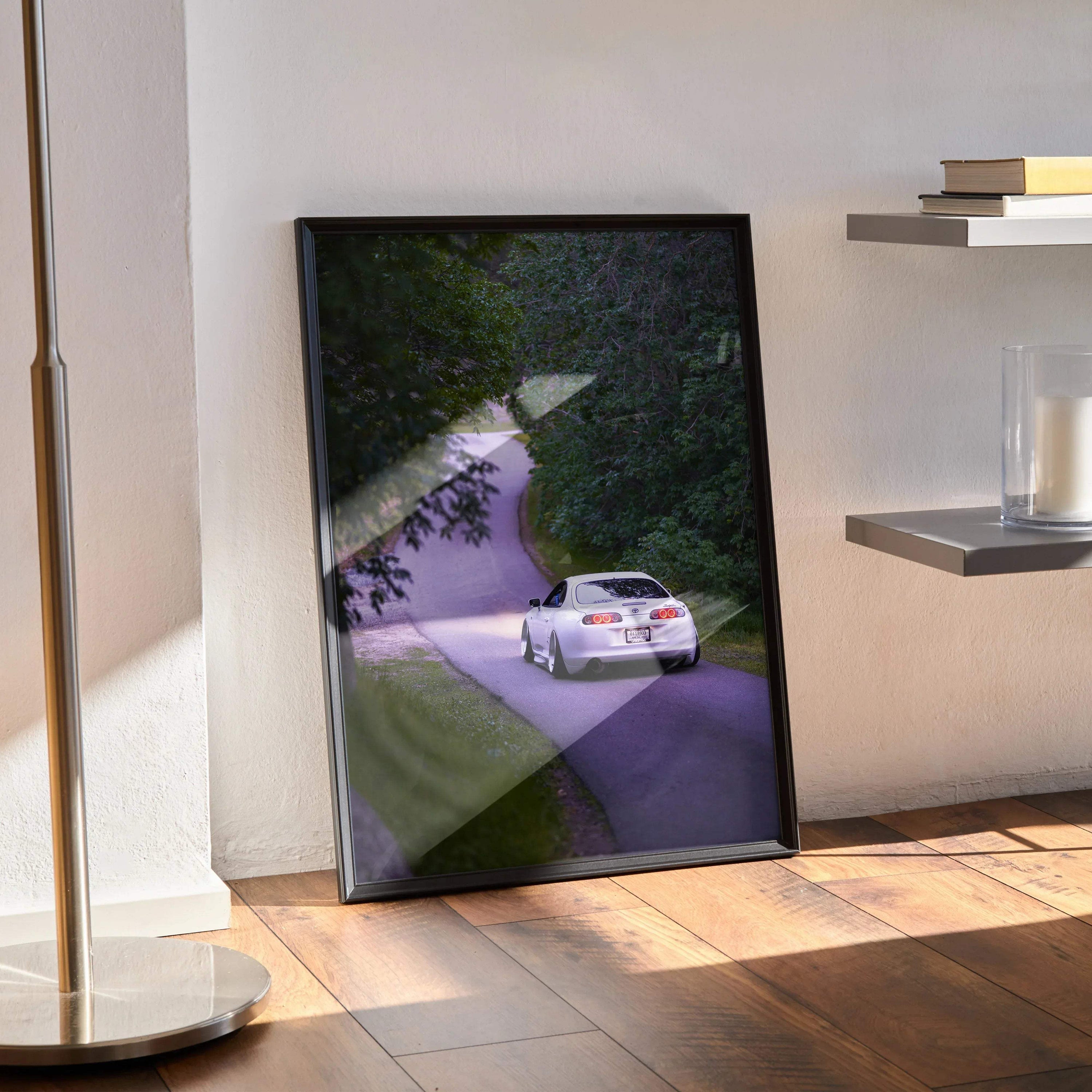 Toyota Supra MK4 racing on a forest road poster wall art with vibrant colors and sleek design.
