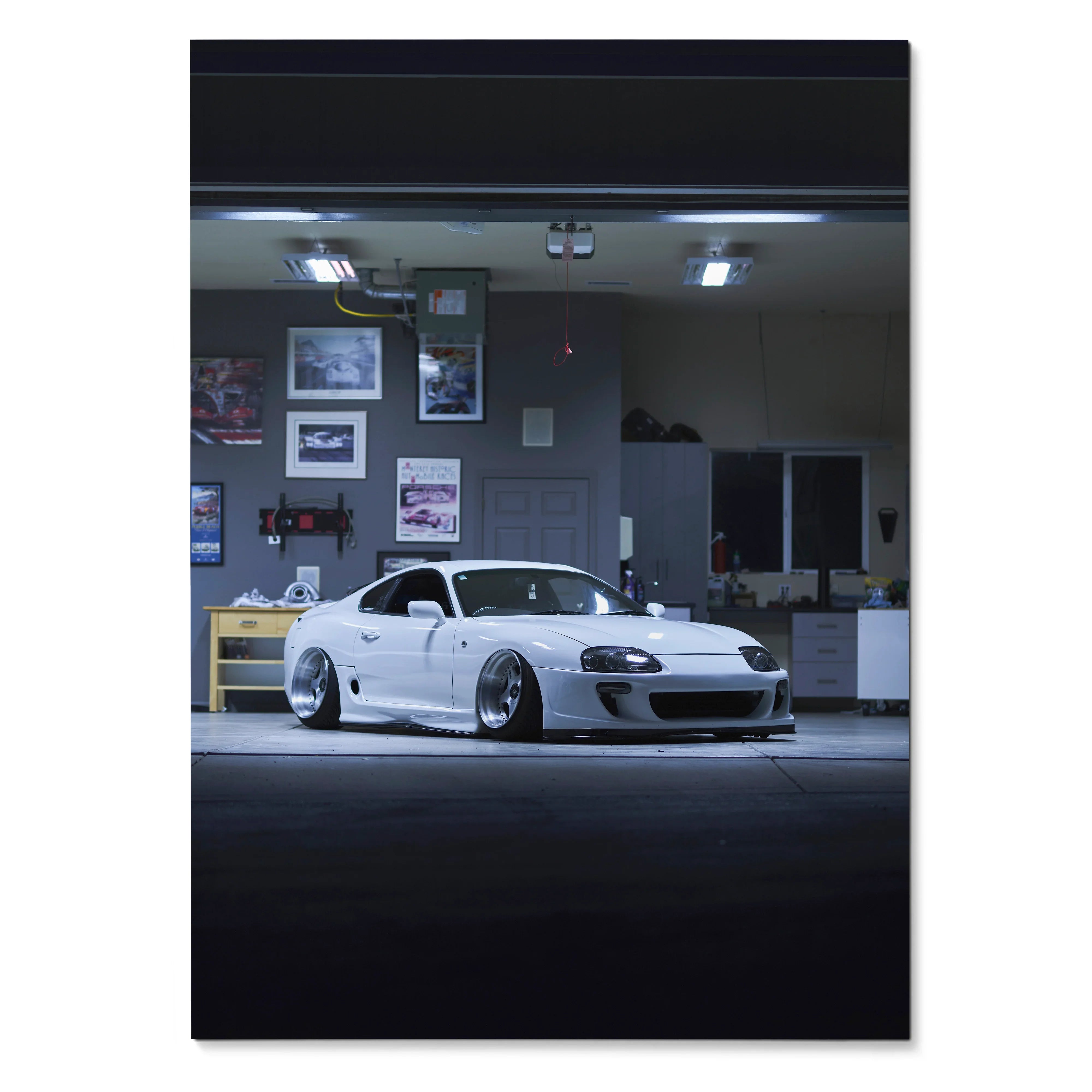 Toyota Supra MK4 white sports car in garage poster wall art with high detail and lighting.