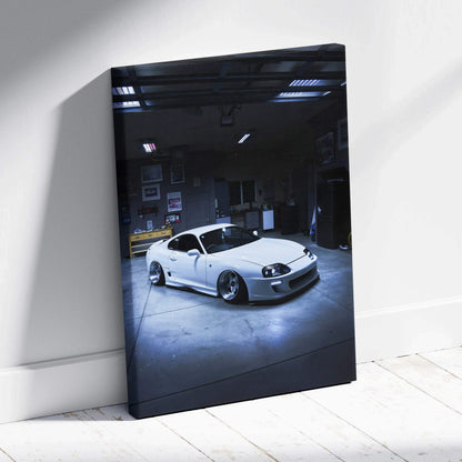 White Toyota Supra MK4 parked indoors on high-resolution vertical canvas art wall print.