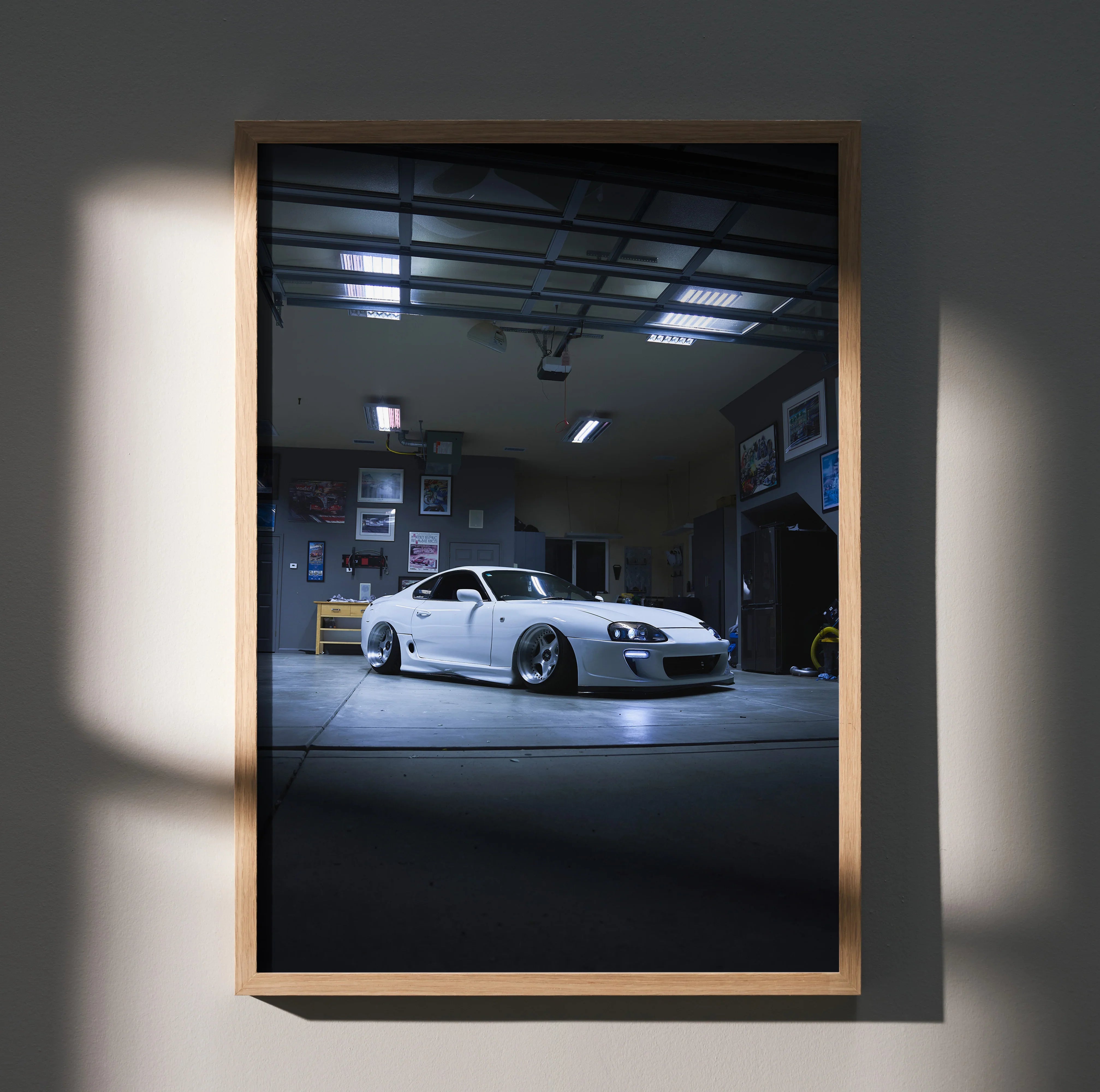 Toyota Supra MK4 white sports car poster with sleek design and garage background wall art.