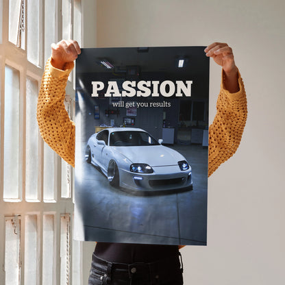 Toyota Supra Mk4 poster with motivational text "Passion will get you results" wall art in dark garage setting.