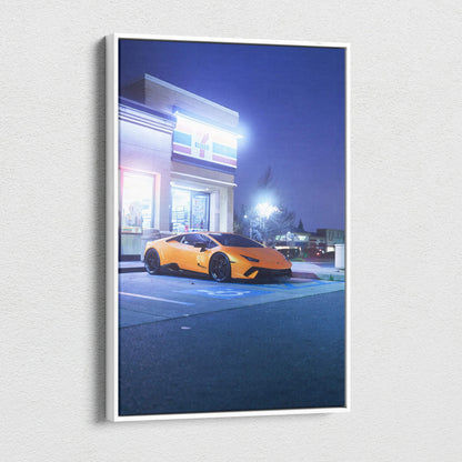 Vertical canvas art featuring a vibrant orange Lamborghini Huracan parked at night, modern wall art canvas print.