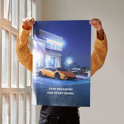 Poster of orange Lamborghini Huracan parked at night with "Stop Dreaming and Start Doing" motivational text.