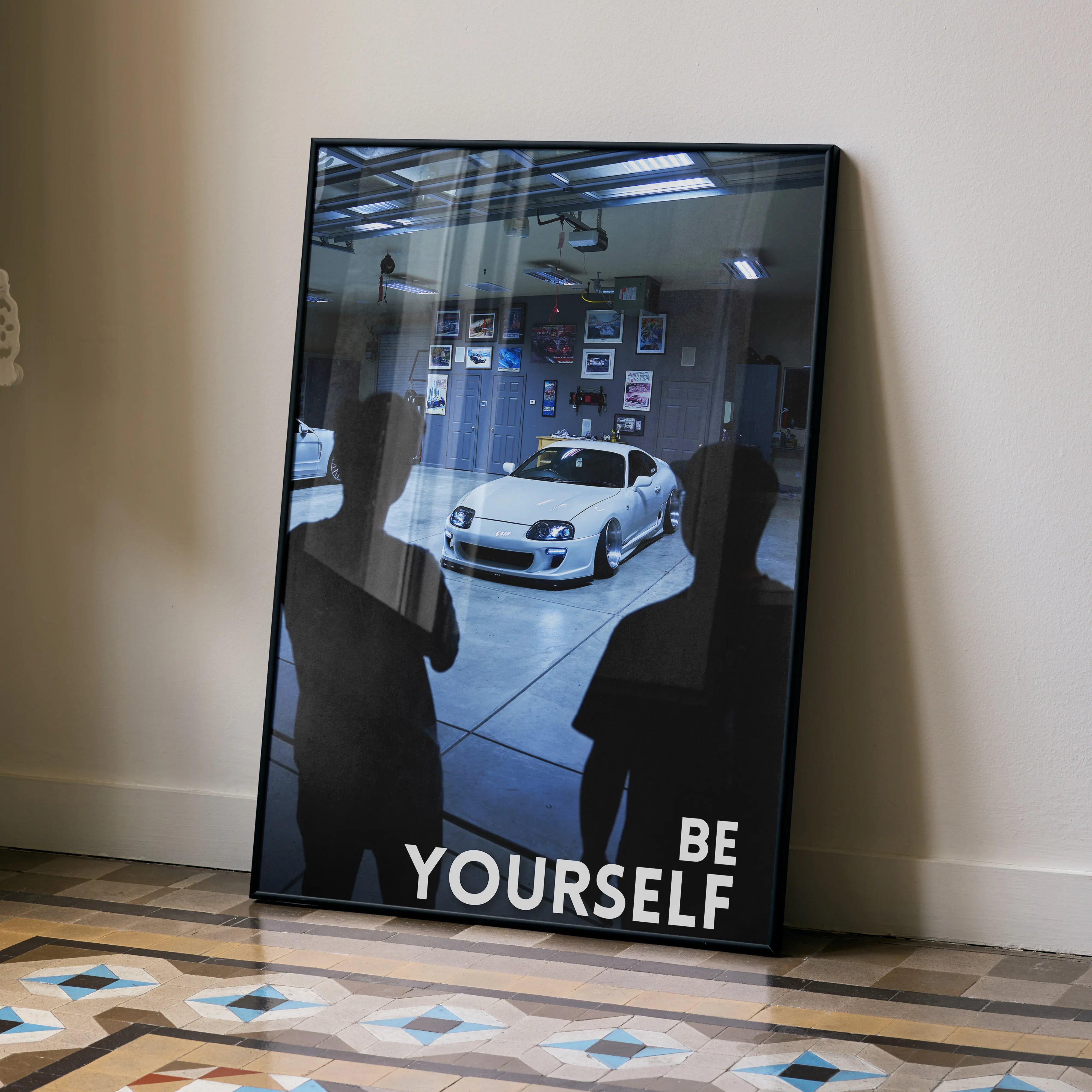 Motivational Toyota Supra Mk4 wall art poster with "Be Yourself" text in black frame.