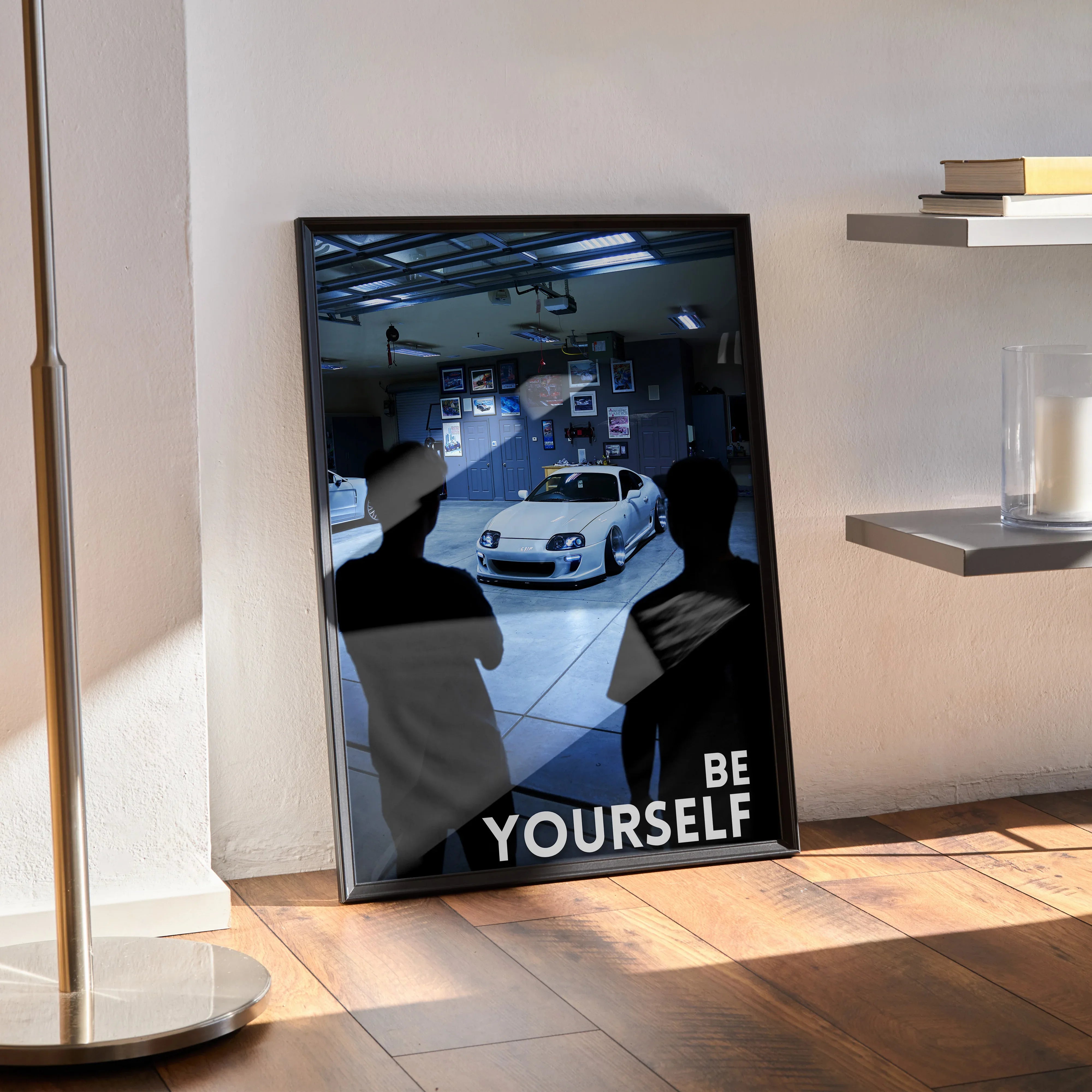 Motivational poster wall art featuring Toyota Supra Mk4 in garage with "Be Yourself" text.