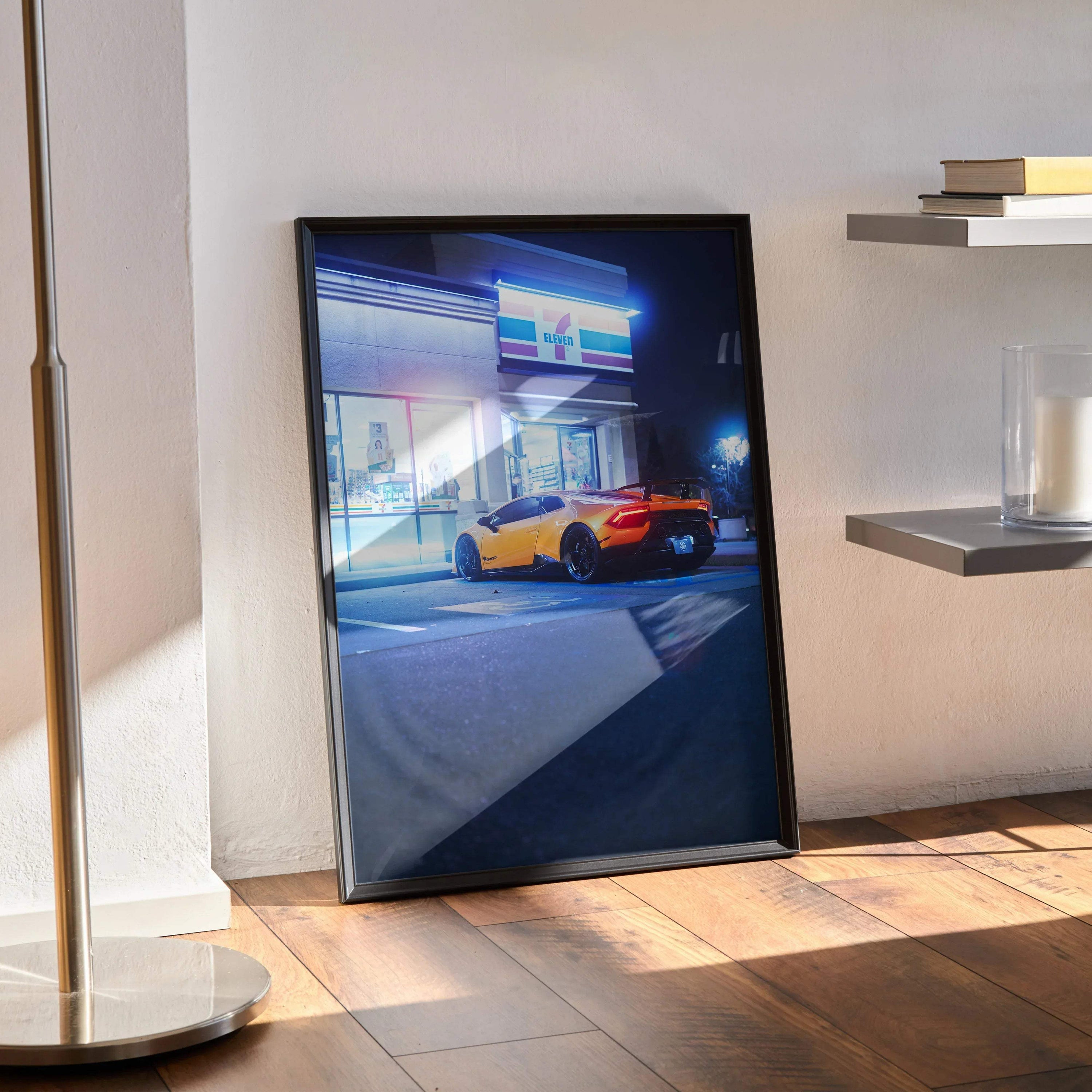 Lamborghini Huracan poster wall art with vibrant orange car illuminated in urban night scene.